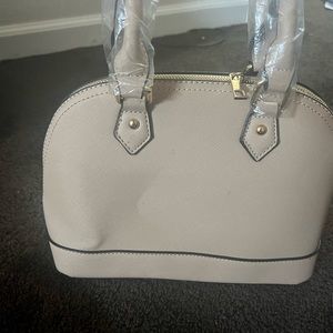 Dome shaped satchel